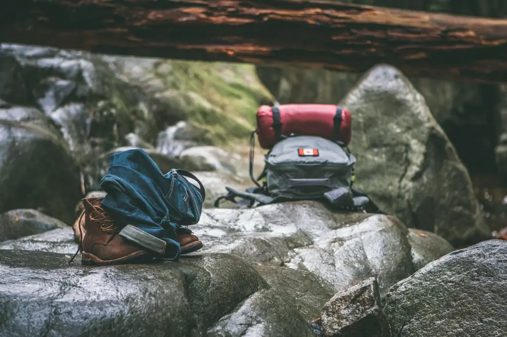 backpack, boots, rocks