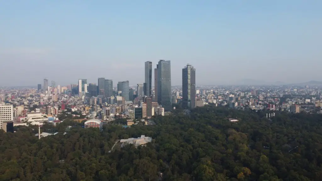 a view of a city from the top of a hill